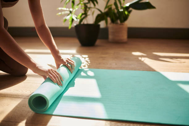 Rolled exercise mat ready for a short home session